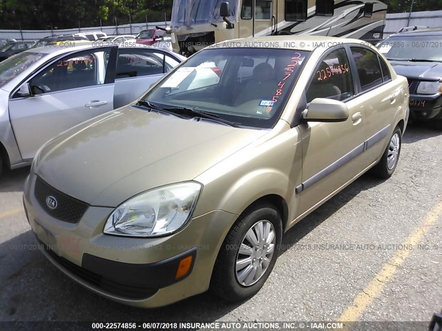 KNADE223996508786 - 2009 KIA RIO LX/SX GOLD photo 2