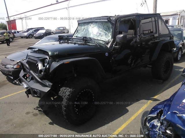 1C4HJWDG0CL116604 - 2012 JEEP WRANGLER UNLIMITE SPORT GREEN photo 2