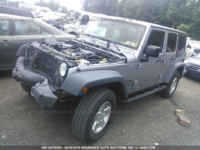 1C4HJWDG4FL556054 - 2015 JEEP WRANGLER UNLIMITE SPORT SILVER photo 2