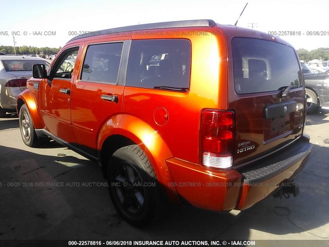 1D8GU28KX8W259769 - 2008 DODGE NITRO SXT ORANGE photo 3