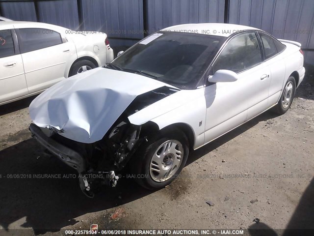 1G8ZY1278XZ355904 - 1999 SATURN SC2 WHITE photo 2