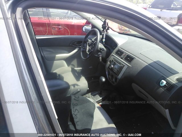 1FAHP37N47W334739 - 2007 FORD FOCUS ZX5/S/SE/SES GRAY photo 5