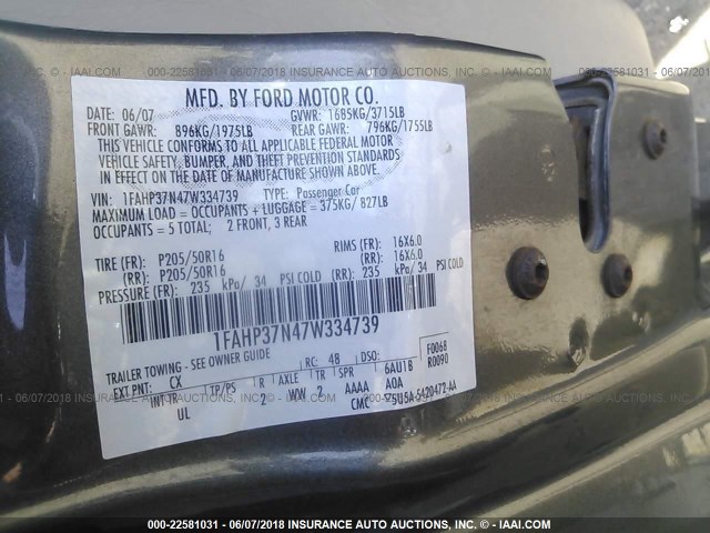 1FAHP37N47W334739 - 2007 FORD FOCUS ZX5/S/SE/SES GRAY photo 9