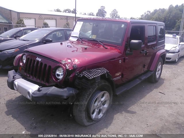 1C4BJWEG8DL547276 - 2013 JEEP WRANGLER UNLIMITE SAHARA RED photo 2