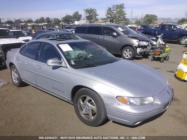 1G2WJ52K7XF334282 - 1999 PONTIAC GRAND PRIX SE SILVER photo 1