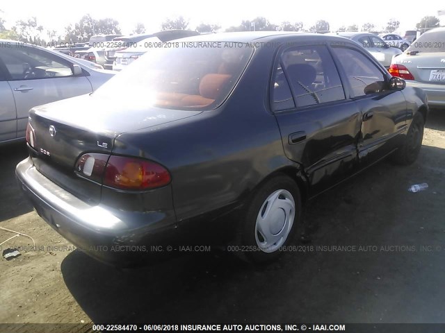 1NXBR12E1XZ230951 - 1999 TOYOTA COROLLA VE/CE/LE BLACK photo 4