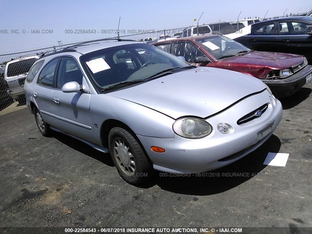 1FAFP58S8WA183021 - 1998 FORD TAURUS SE COMFORT SILVER photo 1