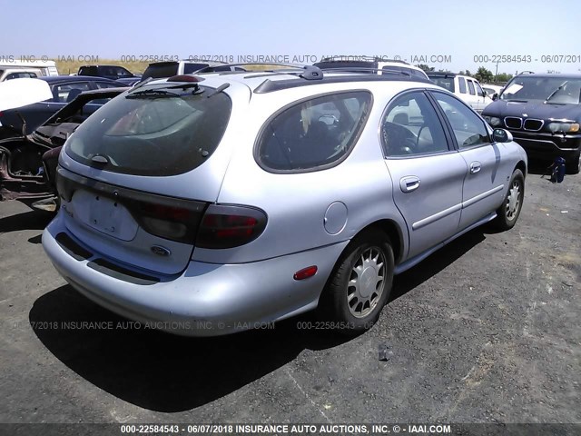 1FAFP58S8WA183021 - 1998 FORD TAURUS SE COMFORT SILVER photo 4