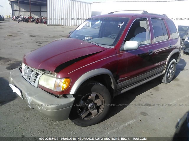 KNDJB7234X5594099 - 1999 KIA SPORTAGE RED photo 2