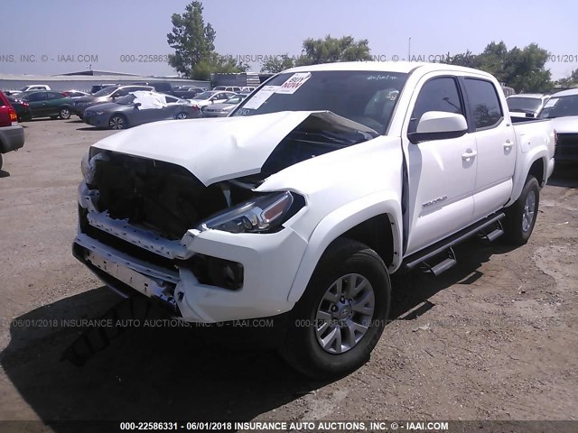 5TFAZ5CN3HX030286 - 2017 TOYOTA TACOMA DBL CAB/SR5/TRD SPORT/OR WHITE photo 2
