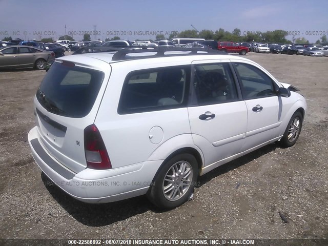 1FAFP36333W342820 - 2003 FORD FOCUS SE/SE SPORT/ZTW WHITE photo 4