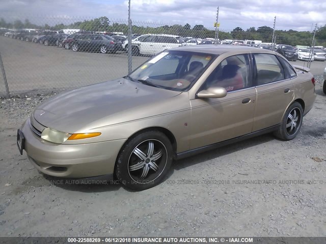 1G8JS54F52Y549427 - 2002 SATURN L100 TAN photo 2