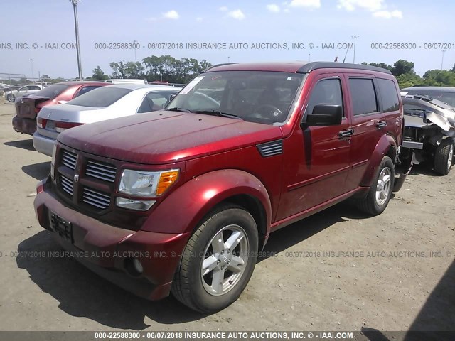 1D4PU5GK2BW514457 - 2011 DODGE NITRO SXT RED photo 2