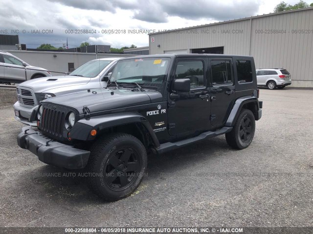 1J4GA59198L517158 - 2008 JEEP WRANGLER UNLIMITE SAHARA BLACK photo 2