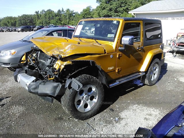 1C4AJWBG5EL167801 - 2014 JEEP WRANGLER SAHARA ORANGE photo 2