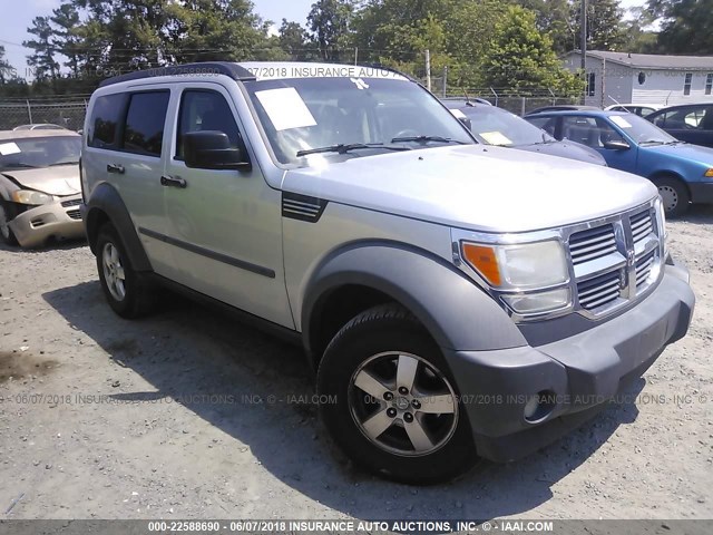 1D8GU28K57W666896 - 2007 DODGE NITRO SXT SILVER photo 1