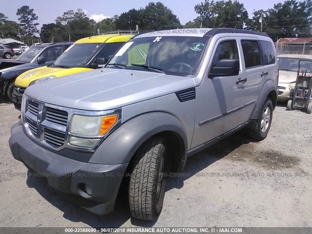 1D8GU28K57W666896 - 2007 DODGE NITRO SXT SILVER photo 2