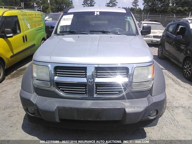 1D8GU28K57W666896 - 2007 DODGE NITRO SXT SILVER photo 6