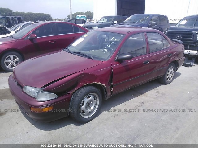 1Y1SK5265SZ010132 - 1995 GEO PRIZM LSI RED photo 2