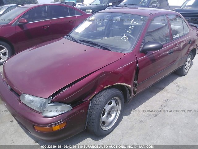 1Y1SK5265SZ010132 - 1995 GEO PRIZM LSI RED photo 6