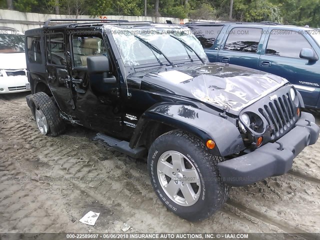 1J4BA5H16BL551089 - 2011 JEEP WRANGLER UNLIMITE SAHARA BLACK photo 1