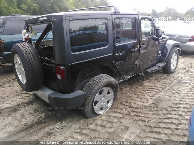 1J4BA5H16BL551089 - 2011 JEEP WRANGLER UNLIMITE SAHARA BLACK photo 4