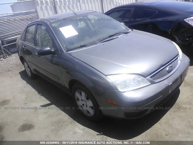 1FAFP34N77W106844 - 2007 FORD FOCUS ZX4/S/SE/SES GRAY photo 1