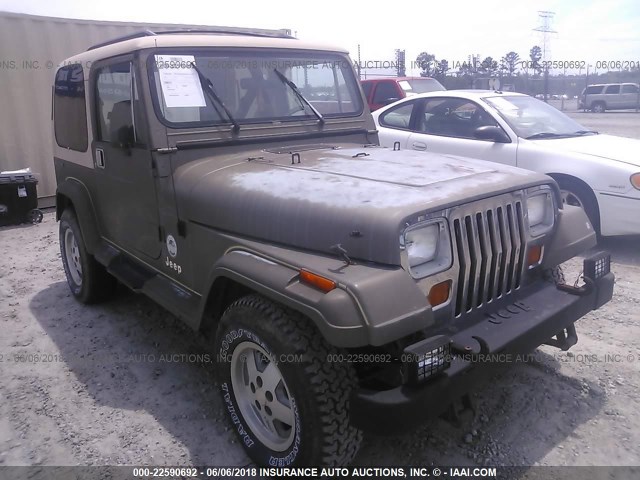 2J4FY49T7KJ151099 - 1989 JEEP WRANGLER / YJ SAHARA BROWN photo 1