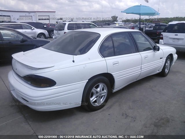 1G2HX52KXXH231336 - 1999 PONTIAC BONNEVILLE SE WHITE photo 4