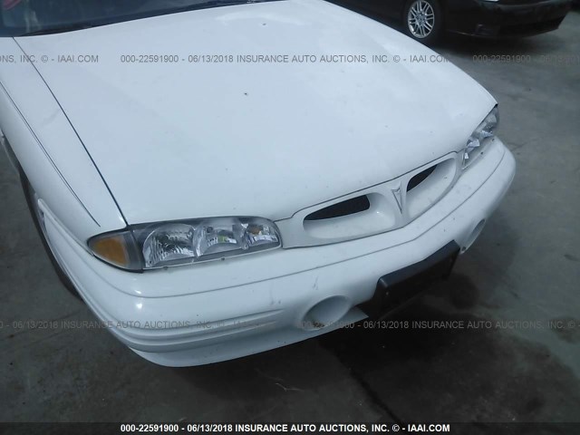 1G2HX52KXXH231336 - 1999 PONTIAC BONNEVILLE SE WHITE photo 6