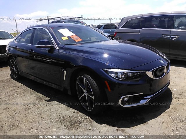 WBA4J5C54KBM65050 - 2019 BMW 440I BLACK photo 1