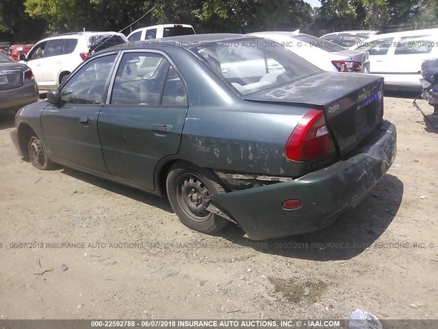 JA3AY26A7XU006405 - 1999 MITSUBISHI MIRAGE DE GREEN photo 4