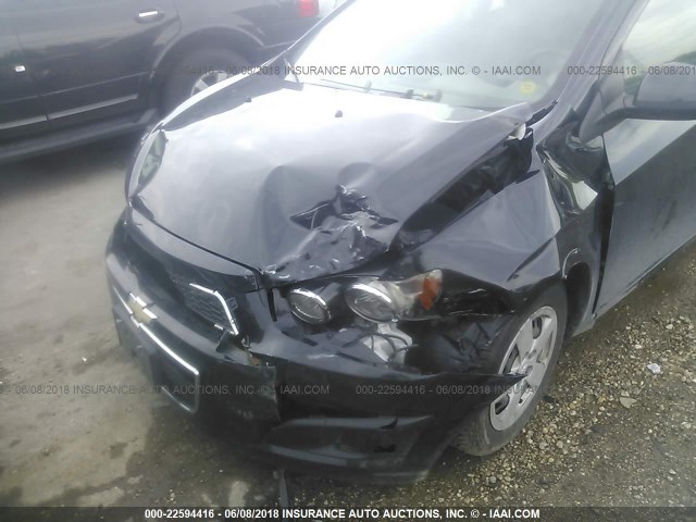 1G1JA6SH2E4147453 - 2014 CHEVROLET SONIC LS BLACK photo 6