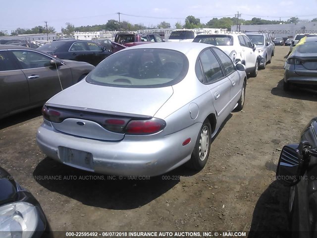 1FAFP53S2XA255033 - 1999 FORD TAURUS SE/COMFORT/SPORT GRAY photo 4