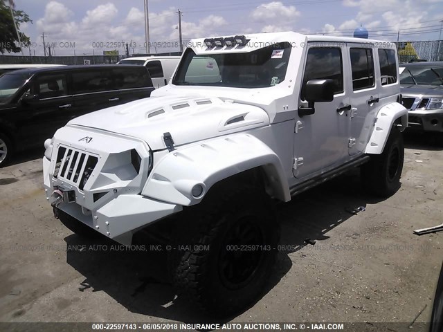 1C4HJWDG0GL265939 - 2016 JEEP WRANGLER UNLIMITE SPORT WHITE photo 2