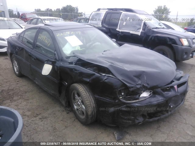 1G2NV52EX2M572996 - 2002 PONTIAC GRAND AM GT1 BLACK photo 1