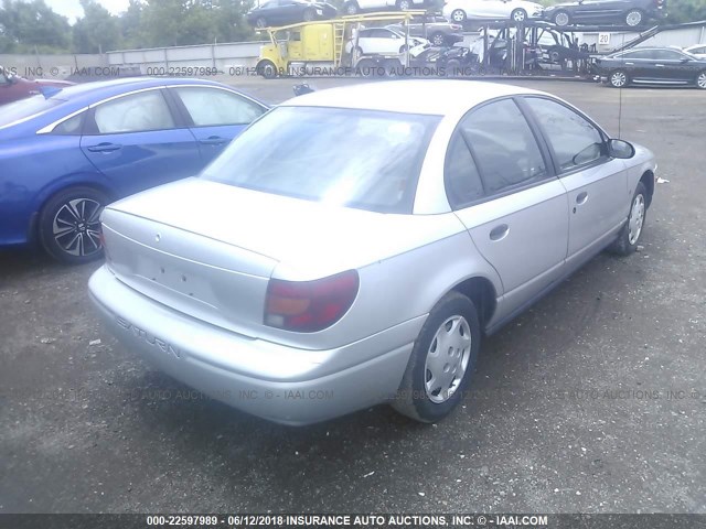 1G8ZH52822Z259243 - 2002 SATURN SL1 SILVER photo 4