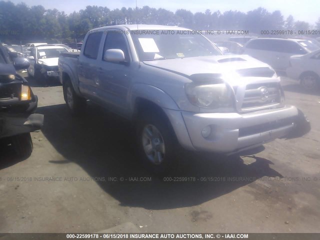 3TMLU4EN8AM054383 - 2010 TOYOTA TACOMA DOUBLE CAB SILVER photo 1