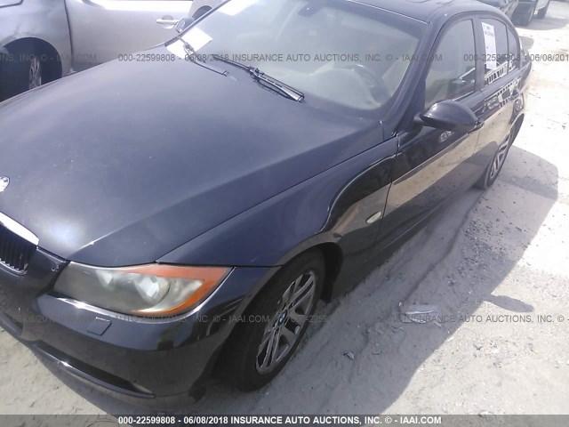 WBAVC93577KX54369 - 2007 BMW 328 XI BLACK photo 2