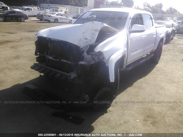 3TMAZ5CN2GM014388 - 2016 TOYOTA TACOMA DBL CAB/SR5/TRD SPORT/OR WHITE photo 2