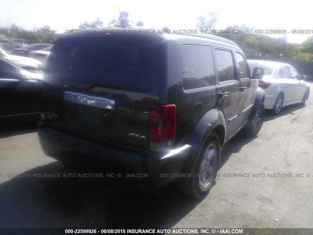 1D8GU58K58W128637 - 2008 DODGE NITRO SLT BLACK photo 4