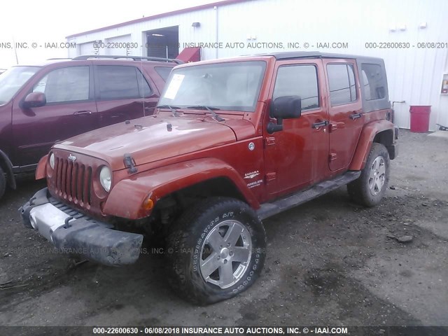 1J4GA59169L752098 - 2009 JEEP WRANGLER UNLIMITE SAHARA ORANGE photo 2