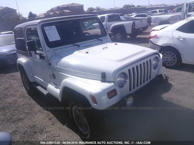 1J4FY49S4XP418992 - 1999 JEEP WRANGLER / TJ SAHARA WHITE photo 1