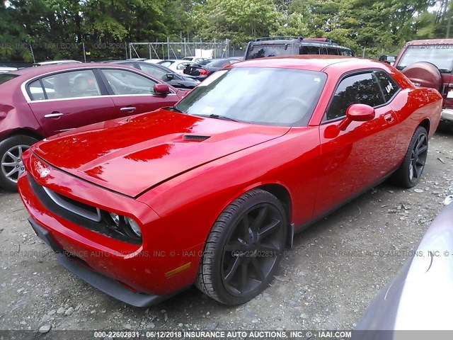 2B3CJ4DV7AH174623 - 2010 DODGE CHALLENGER SE RED photo 2