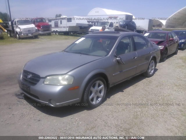 JN1CA31A8YT023445 - 2000 NISSAN MAXIMA GLE/GXE/SE SILVER photo 2