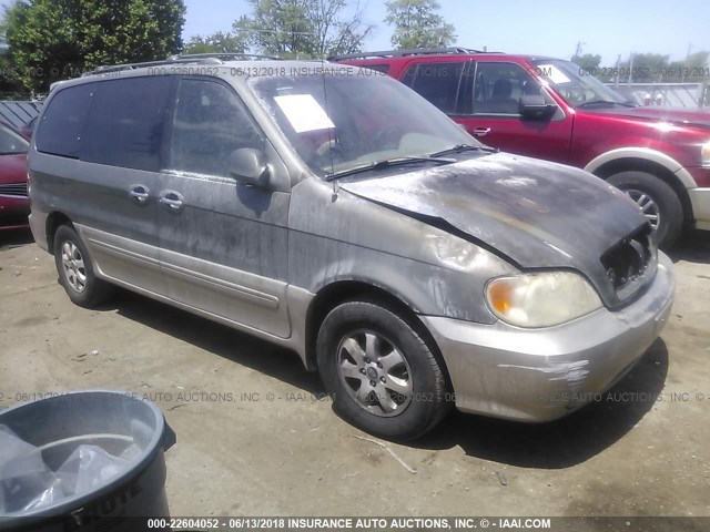 KNDUP131746546112 - 2004 KIA SEDONA EX/LX GRAY photo 1