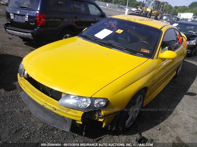 6G2VX12G54L257992 - 2004 PONTIAC GTO YELLOW photo 2