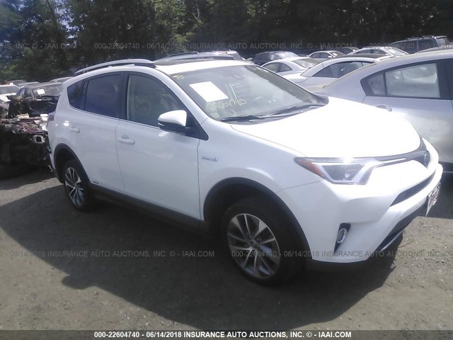 JTMRJREV3GD000431 - 2016 TOYOTA RAV4 HV XLE WHITE photo 1