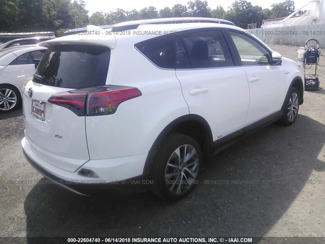 JTMRJREV3GD000431 - 2016 TOYOTA RAV4 HV XLE WHITE photo 4