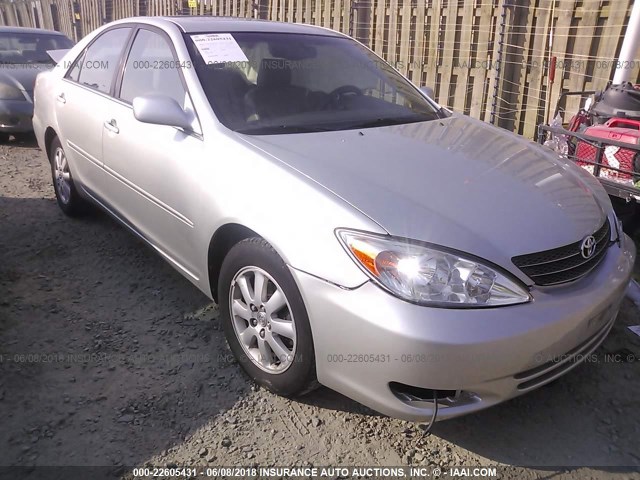 JTDBE30K930197512 - 2003 TOYOTA CAMRY LE/XLE Silber Foto 1